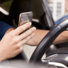 Majority of drivers unconvinced that strengthened laws on handheld mobile phone use at the wheel will make the roads safer