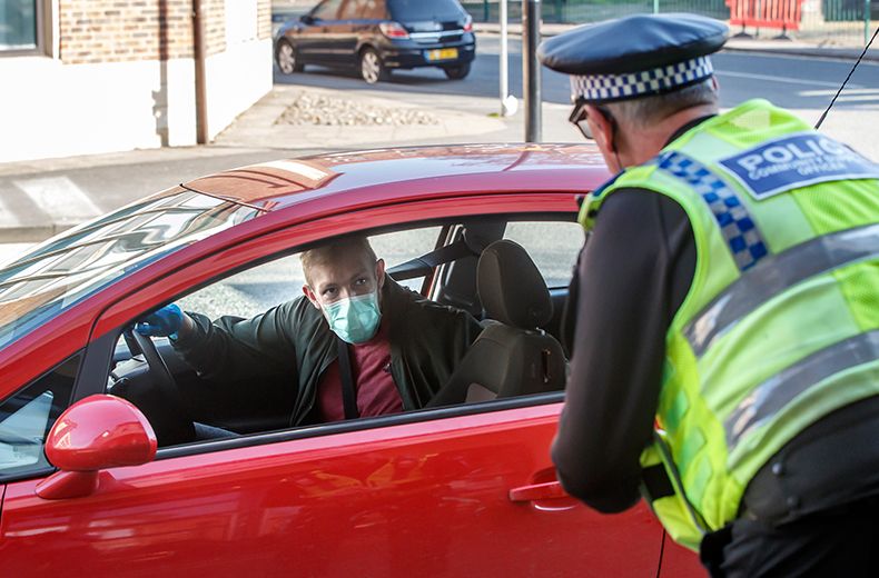 Driver stopped with wife in the boot during non-essential trip as police ramp up travel checkpoints