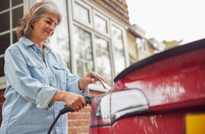 Electric car chargers to be installed in every new home and office in England