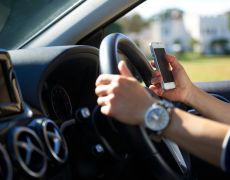 The RAC implores police forces to 'turn up the dial' on drivers' handheld mobile phone use