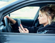 Police to charge 'rubberneckers' for filming crash while driving